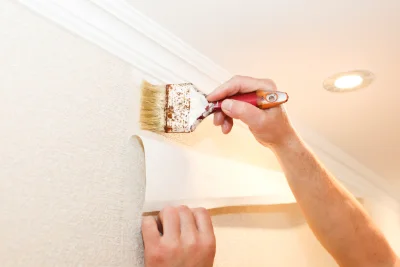 Pose de papier peint à Arguel — revêtements muraux et toiles de verre